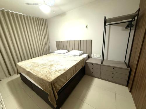 En eller flere senge i et værelse på Apartamento confortável 2 quartos, Piscina, Playground, Sauna em Belém