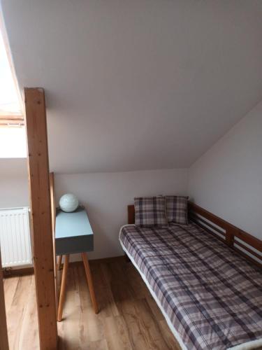 Giường trong phòng chung tại Apartment Waldfrieden
