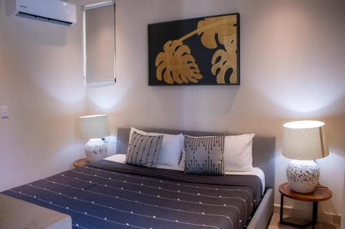 Ένα ή περισσότερα κρεβάτια σε δωμάτιο στο Peregrina Tulum 202A 2BR Luxury Condo