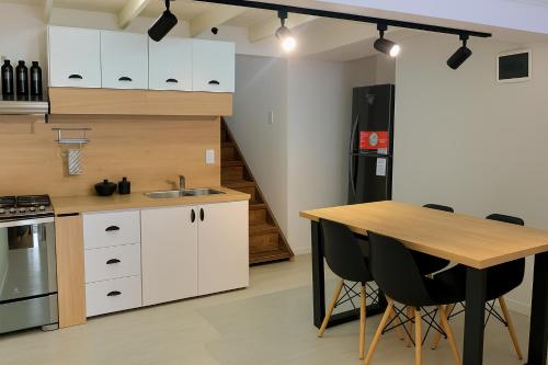 مطبخ أو مطبخ صغير في Casa Mirador Austral La familia entera en un solo lugar con una increíble vista y tranquilidad