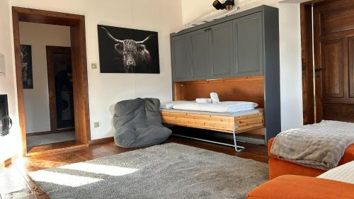 En eller flere senge i et værelse på Castellino di Castello di fiemme