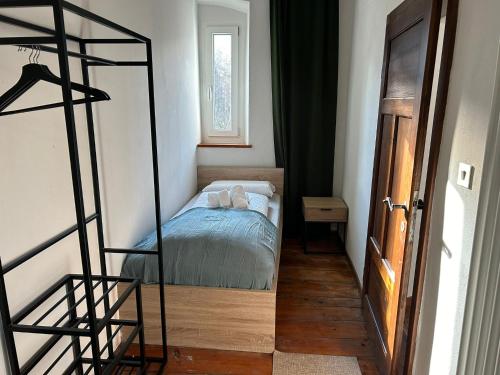 En eller flere senge i et værelse på Castellino di Castello di fiemme