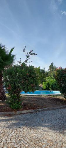 a swimming pool in the middle of a resort at Lugar de Levides in Levide