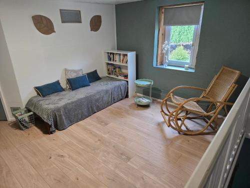 Ένα ή περισσότερα κρεβάτια σε δωμάτιο στο Home Sweet Vosges gîte Montana