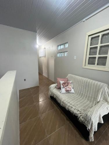 Ένα ή περισσότερα κρεβάτια σε δωμάτιο στο Casa de Praia