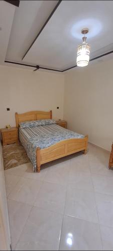 Ένα ή περισσότερα κρεβάτια σε δωμάτιο στο charming apartment