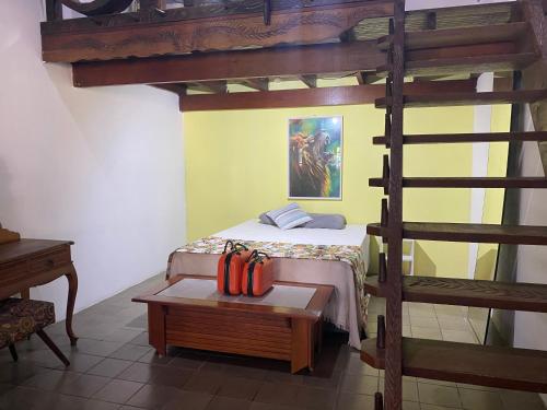 En eller flere senge i et værelse på Refúgio do Rio