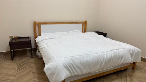 Postel nebo postele na pokoji v ubytování In The Peaks