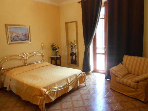 Katil atau katil-katil dalam bilik di B&B Villa Di Bartolomeo