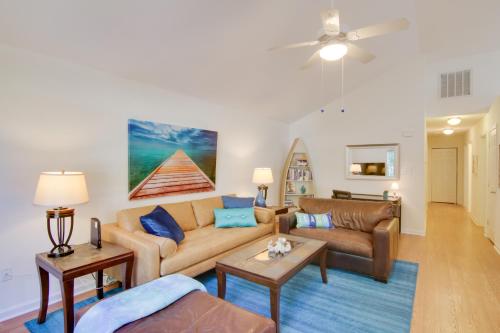 a living room with a couch and a table at Quiet Ocean Pines Retreat Dogs Welcome! in Ocean Pines