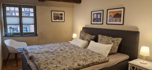 En eller flere senge i et værelse på Apartments in der Barockscheune