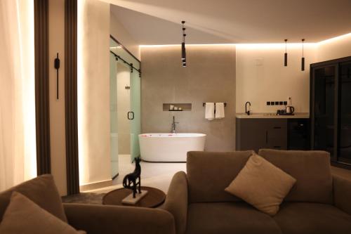 Ένα μπάνιο στο Jood Alula Apartment