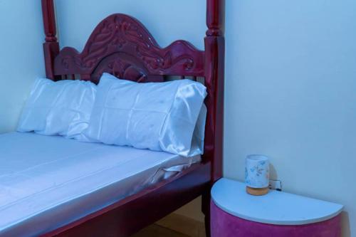 Giường trong phòng chung tại Modern Oasis 5 Mins to Acacia Mall CJs and Padel