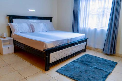 Fotografie z fotogalerie ubytování Modern Oasis 5 Mins to Acacia Mall CJs and Padel v destinaci Kampala