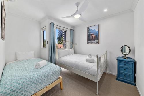 En eller flere senge i et værelse på The Highland Suite