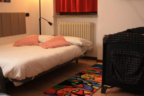 Postel nebo postele na pokoji v ubytování Leo House