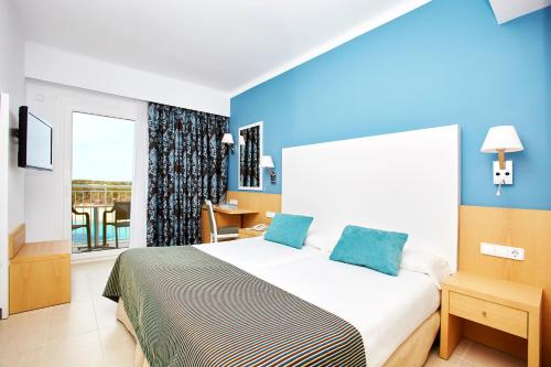 Кровать или кровати в номере Universal Hotel Marqués