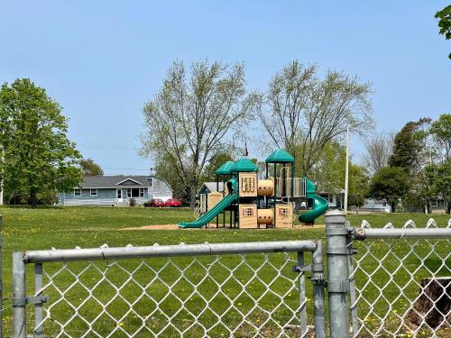 a playground with a slide in a park at Comfort Room-Free Parking & Cozy Stay in Charlottetown in Charlottetown