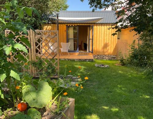 Tinyhouse v zahradě