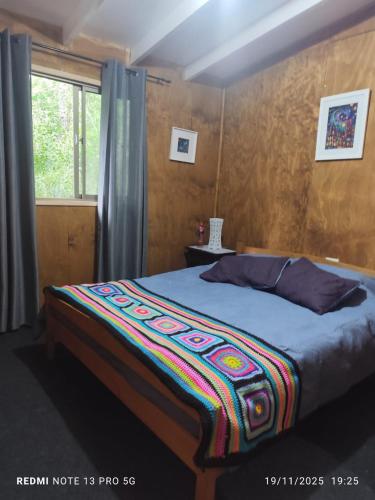 Postel nebo postele na pokoji v ubytování Rosa de los vientos Sur