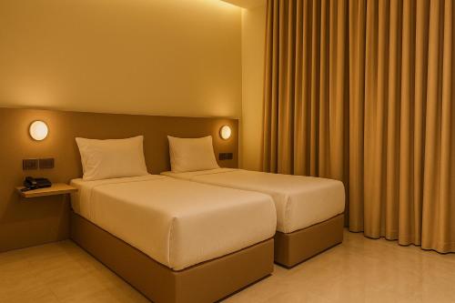 Ένα ή περισσότερα κρεβάτια σε δωμάτιο στο Viaje Hotel Downtown Cairo