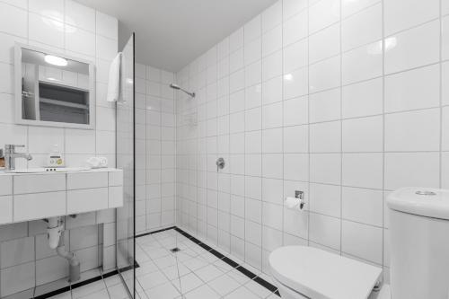 Et badeværelse på The Grand Apartment - Silo Complex