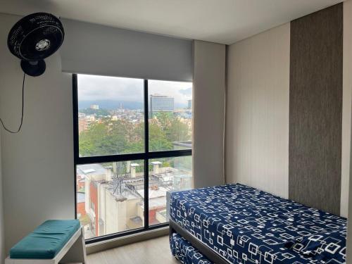 Postel nebo postele na pokoji v ubytování La mejor experiencia: ubicación y comodidad