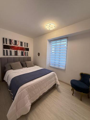 Ένα ή περισσότερα κρεβάτια σε δωμάτιο στο Moderno Apartamento Equipado en Los Palos Grandes - Caracas