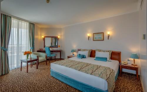 Katil atau katil-katil dalam bilik di Best Western Plus Khan Hotel