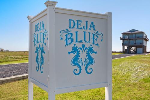a sign for a drug store with a sign for a drink blue at Deja Blue home in Caplen