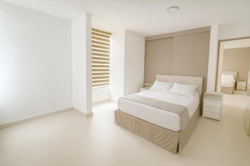 Postel nebo postele na pokoji v ubytování SextoMaíz