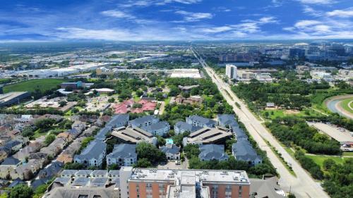 an aerial view of a city with buildings at Cozy 3-Bd Haven Close to Med Center & Downtown HTX in Houston
