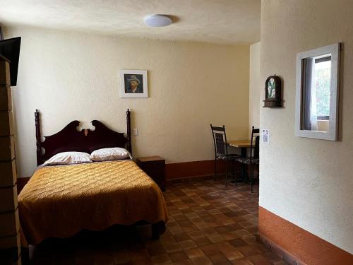 Postel nebo postele na pokoji v ubytování El Agave