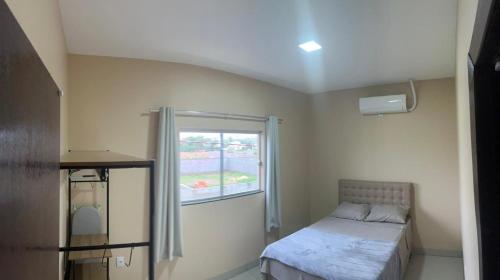 Ένα ή περισσότερα κρεβάτια σε δωμάτιο στο Essenza Lounge