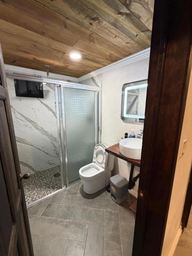 Ванная комната в Cabañas lindo amanecer