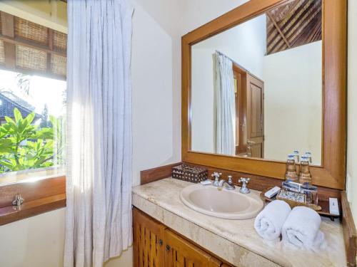 O baie la Villa Diana Bali