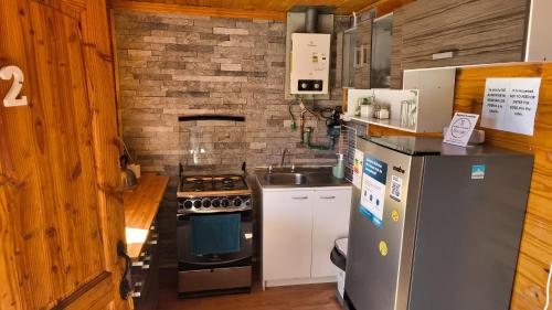 Η κουζίνα ή μικρή κουζίνα στο cabañas mateo 02 nuevo