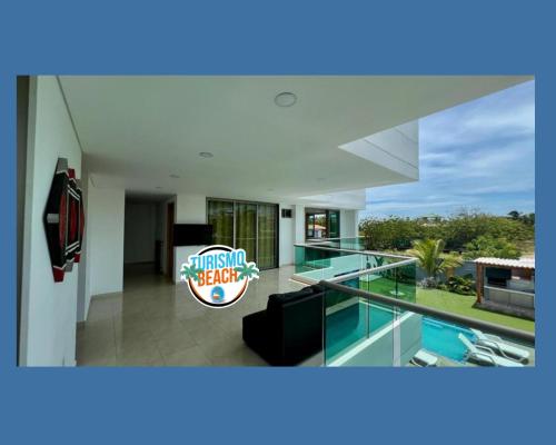 Bazén v ubytování Palmares Beach nebo v jeho okolí