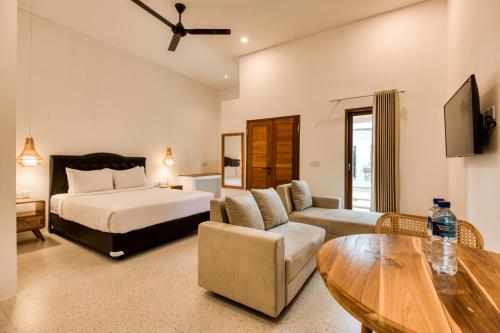 Ένα ή περισσότερα κρεβάτια σε δωμάτιο στο Lala Panzi Villa Managed by Manara