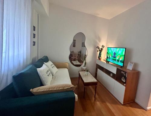 TV a/nebo společenská místnost v ubytování Obelisco Suite