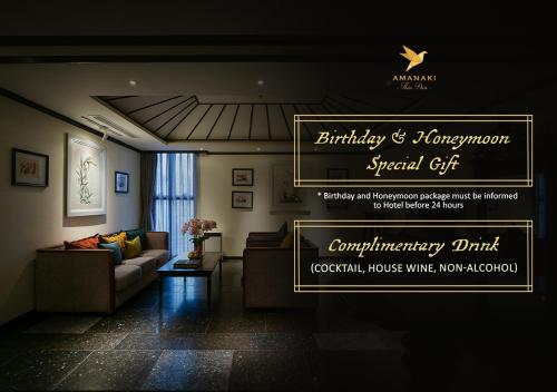 a living room with a sign that reads birthday and anniversary special gift at Amanaki Thao Dien in Ho Chi Minh City