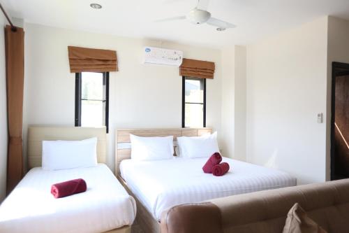 Postel nebo postele na pokoji v ubytování 4BR Pool Villa Rosso