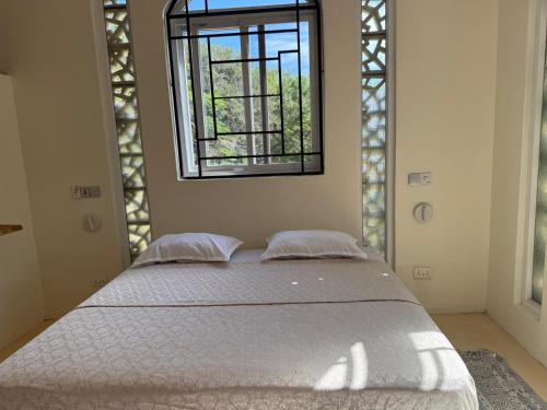 Ένα ή περισσότερα κρεβάτια σε δωμάτιο στο Bellerive