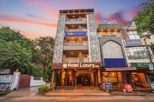 a building with a hotel luxury inn at Via Luxury Inn Adarsh Nagar in New Delhi