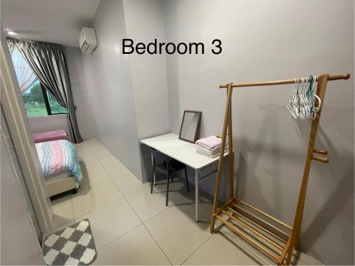 a small room with a desk and a mirror at 4 Bedroom 4 PRIVATE BATHROOM 4B12B 5 min City Center in Ipoh