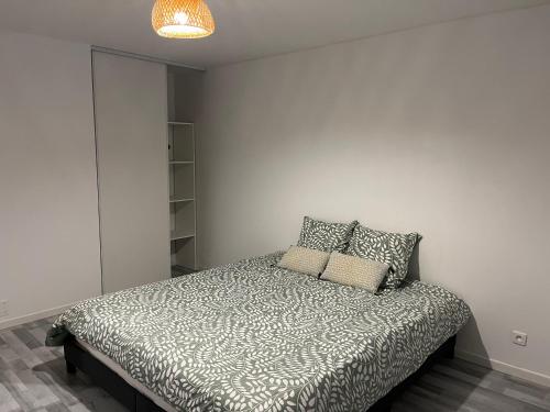 Giường trong phòng chung tại Maison cosy 6 pers Proche Europa-Park