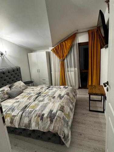 Postel nebo postele na pokoji v ubytování Muz