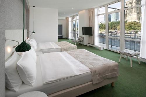 Кровать или кровати в номере Hotel Metropol