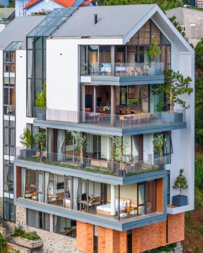 an image of an apartment building with balconies at Là Yên Retreat in Ấp Ða Lợi