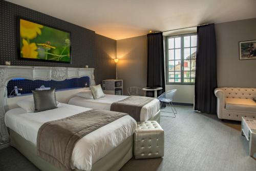 Um quarto em Hotel Le Turenne